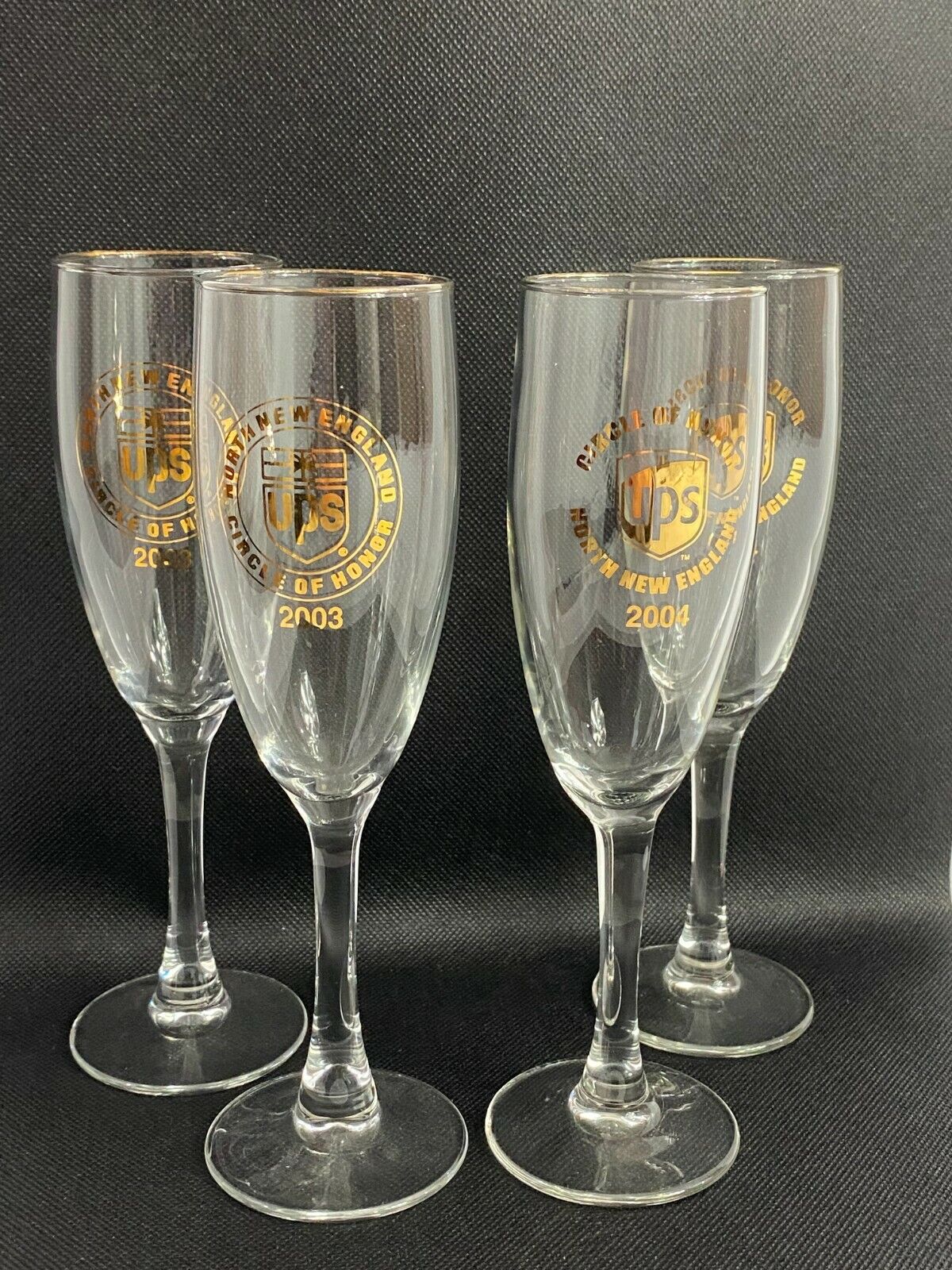 Lot of 4 Champagne Glasses UPS North New England Circle of Honor 2003 & 2004